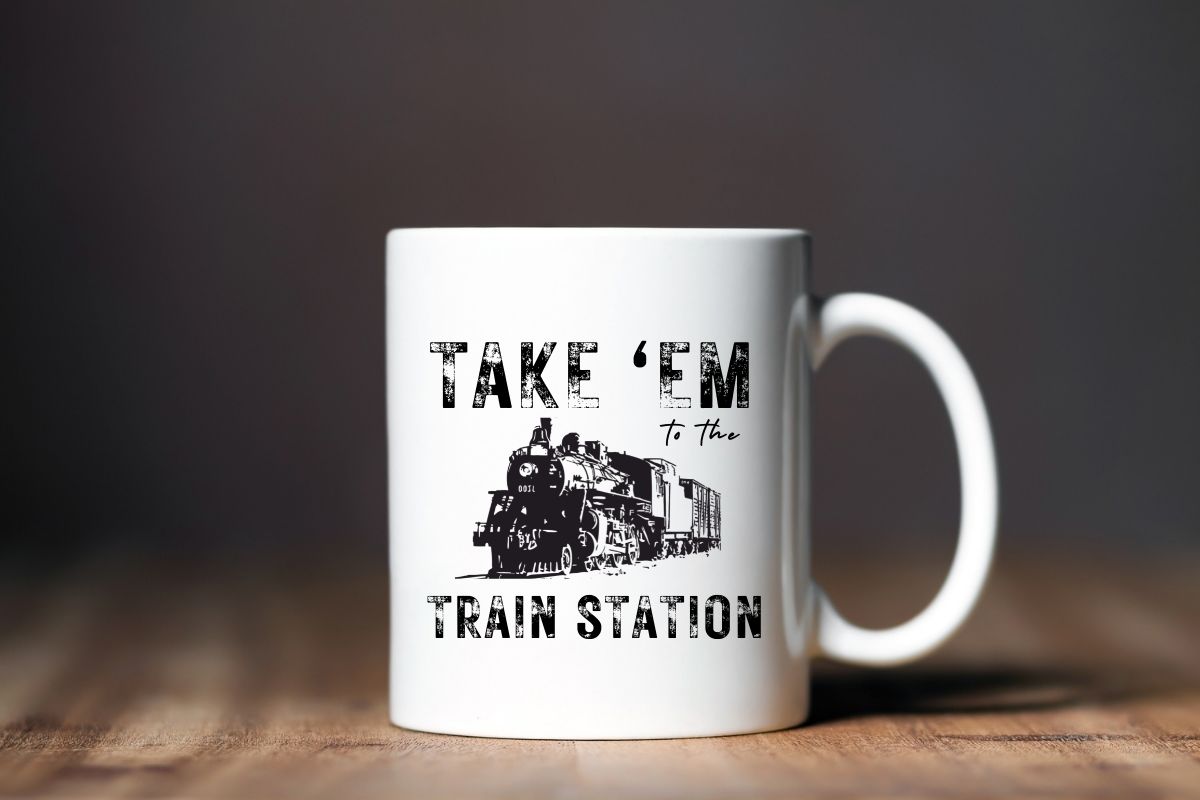 Take Em’ to the Train Station coffee mug